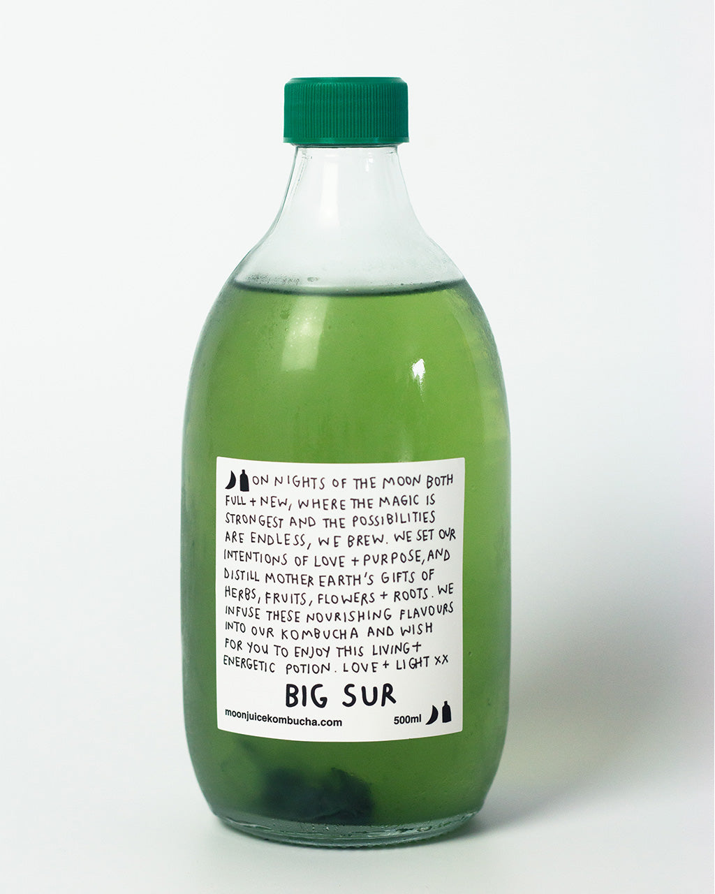 A 500ML bottle of Big Sur (Blueberry Blue Spirulina Kombucha) with a green cap against a clean white background.