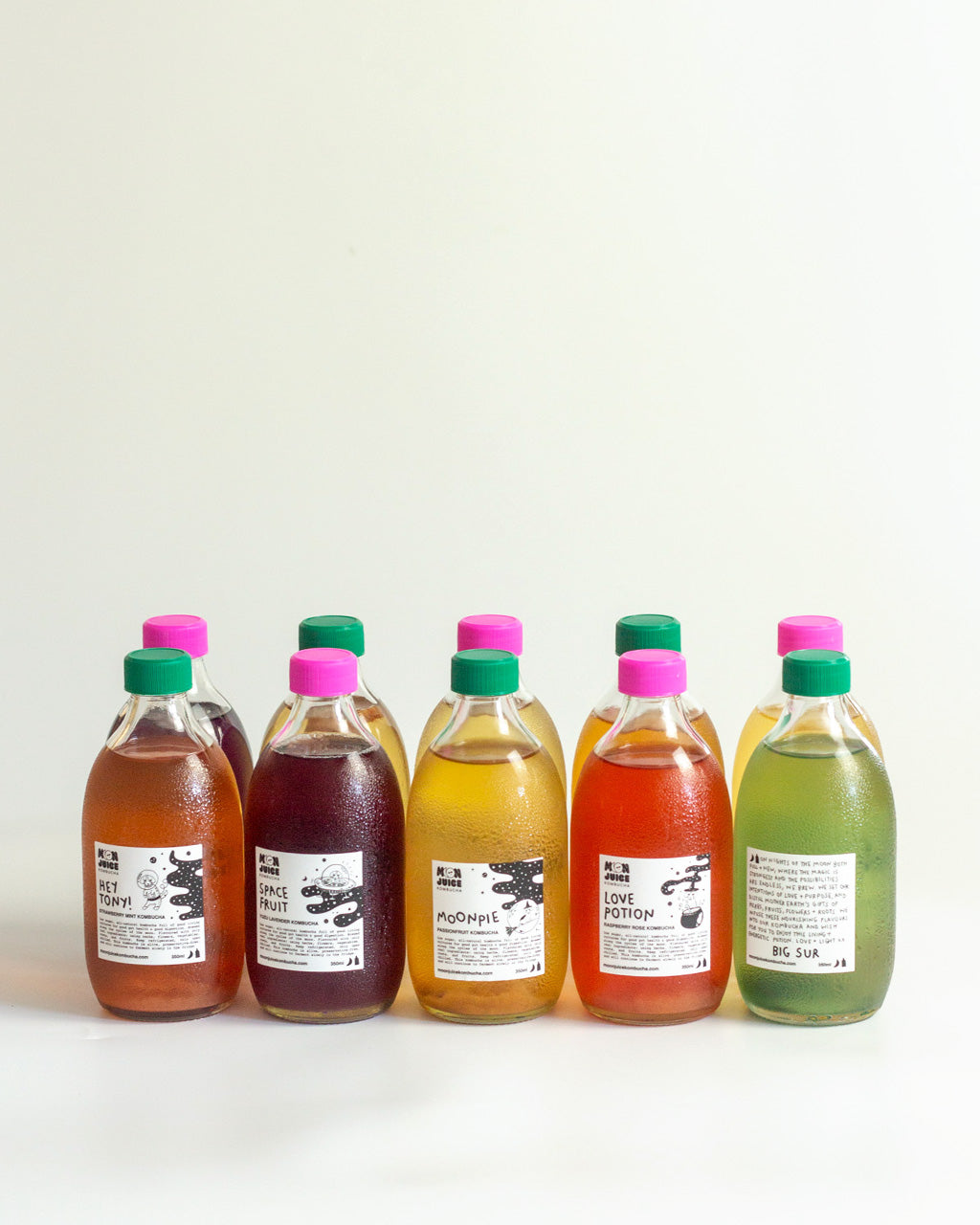 2 rows of 5 kombucha bottles on a light background