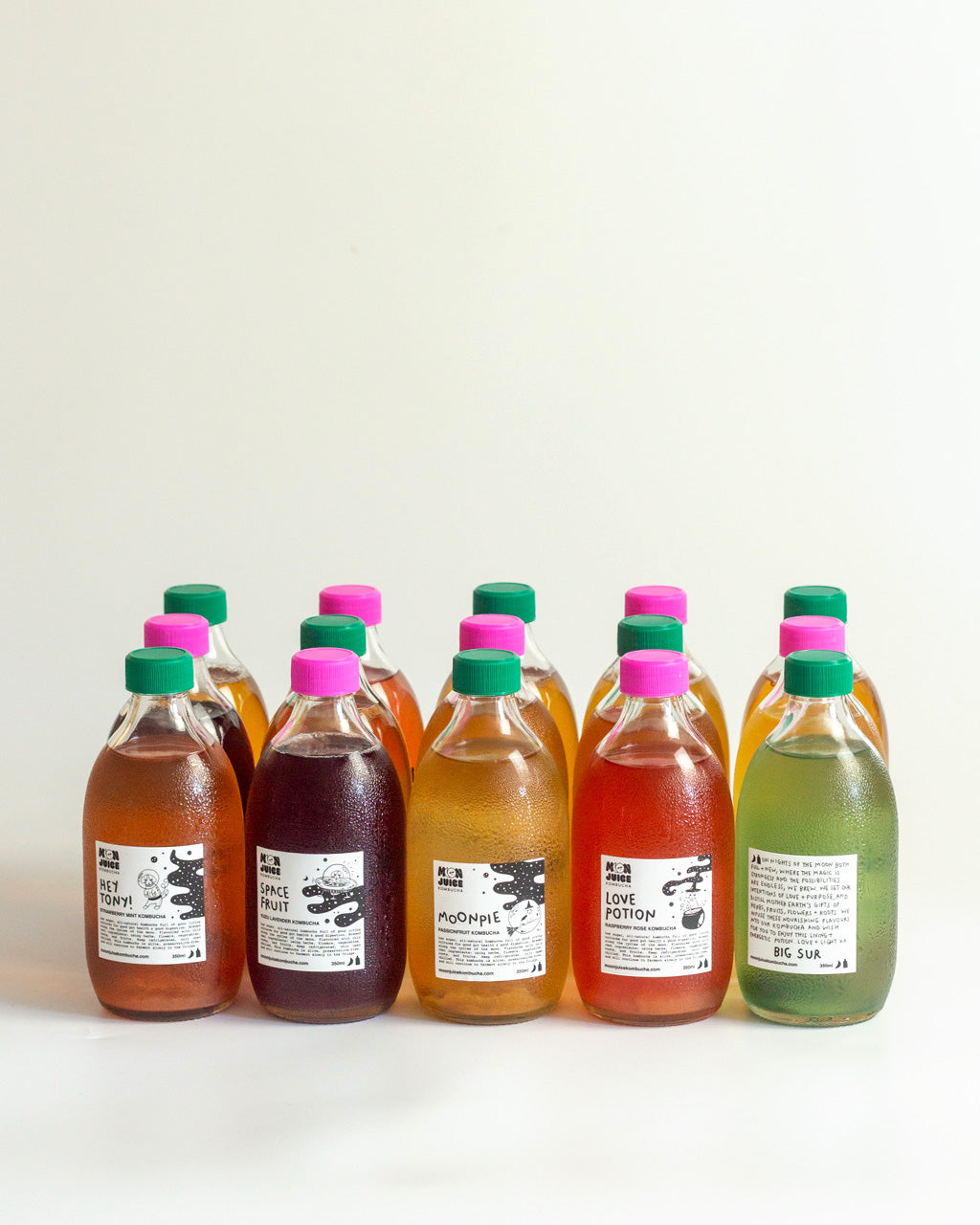3 rows of 5 kombucha bottles on a light background