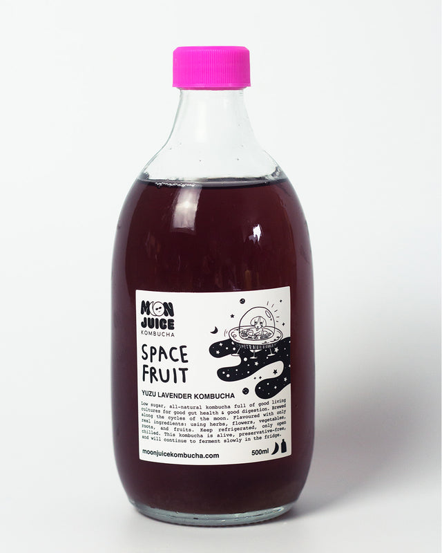 A 500ML bottle of Space Fruit (Yuzu Lavender Kombucha) with a pink cap against a clean white background.