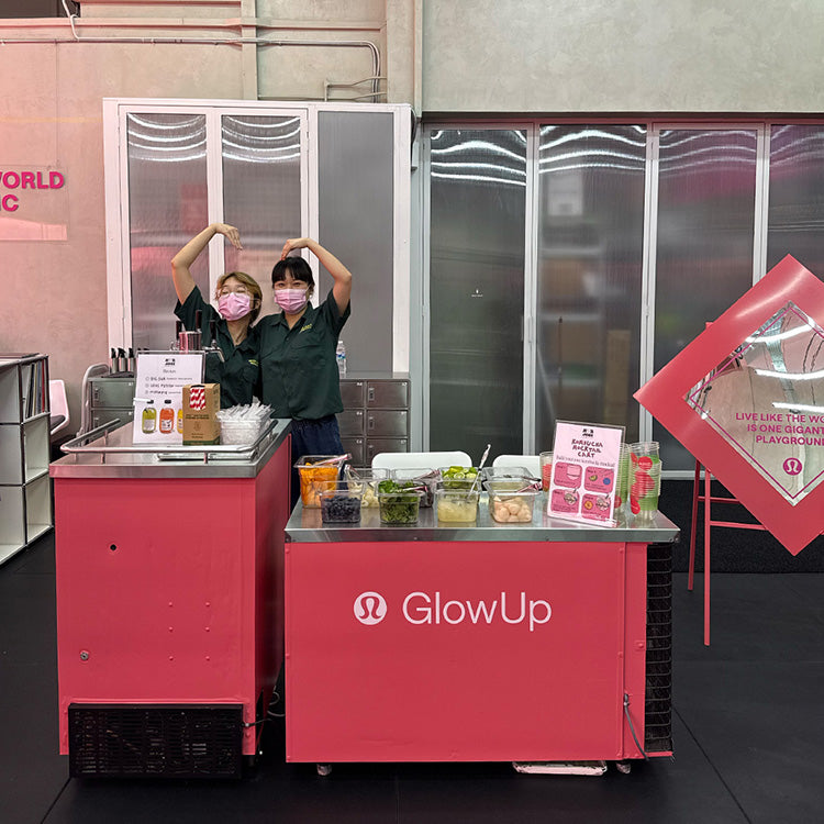 A custom wrapped tap in pink for Lululemon's new product line. Featuring an assortment of fresh fruit toppings in containers on the table next to it.