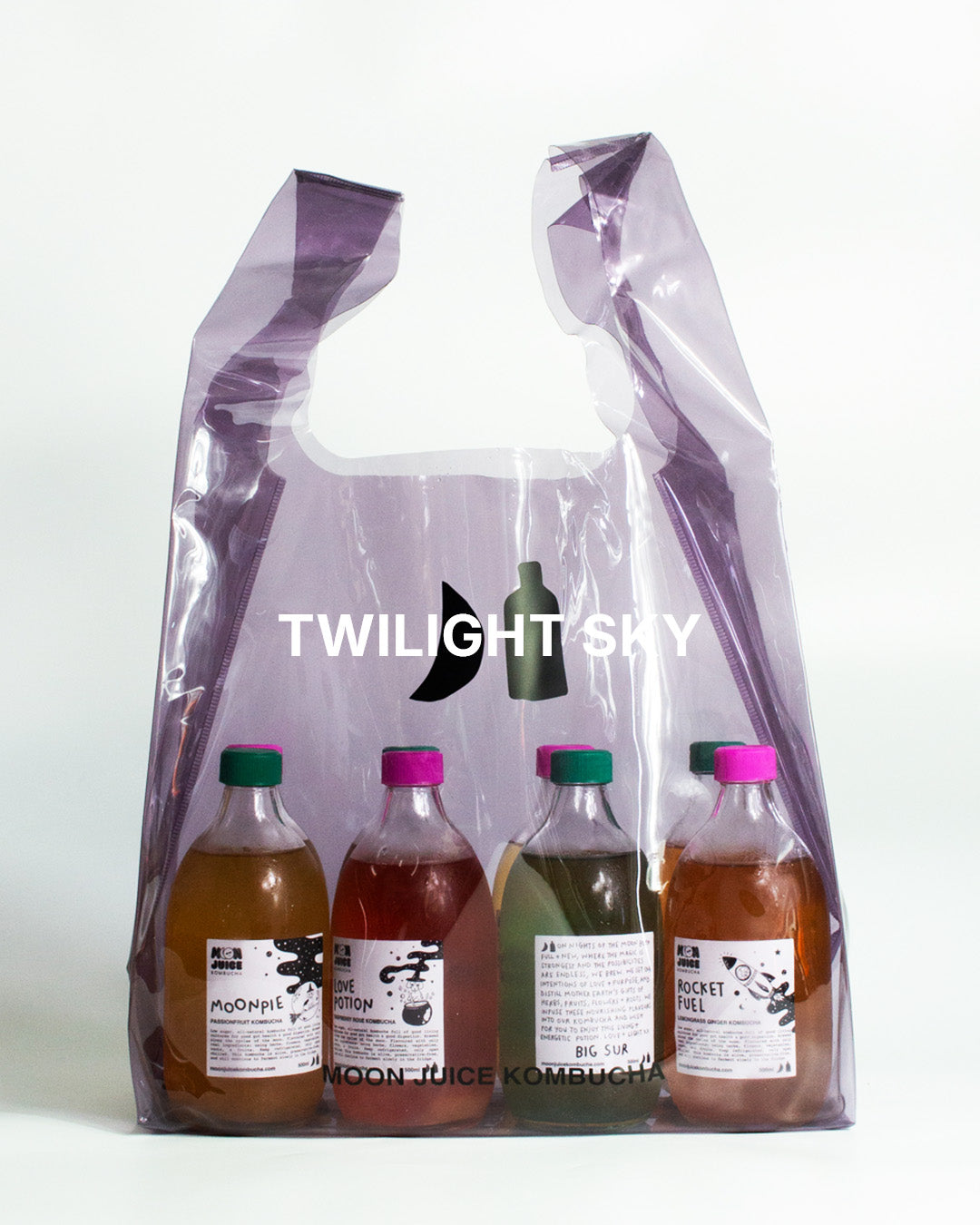 A translucent twilight sky jellybag with printed 'MOON JUICE KOMBUCHA' text, shown against a plain white background. The bag contains 8 kombucha bottles.