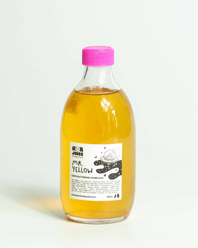 A 350ml bottle of Mr. Yellow (Chrysanthemum Kombucha) with a pink cap against a clean white background.